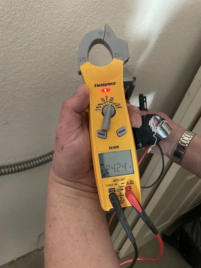Voltage testing with clamp meter during Generator Installation in Larkspur